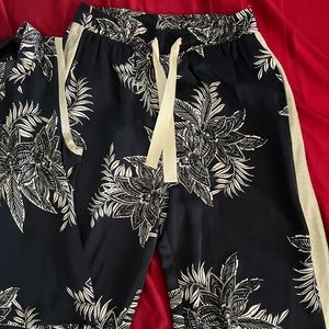 This set is unique. Comes with the matching blouse and long pants.
